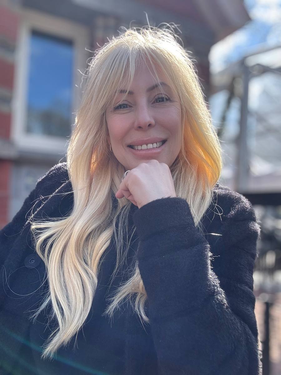 Parting Sea pic women in black sweater with blonde hair